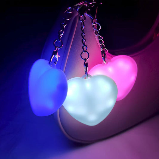 Heart-shaped LED lighted 3-color touch heart keychain. Find what you're looking for in your bag.