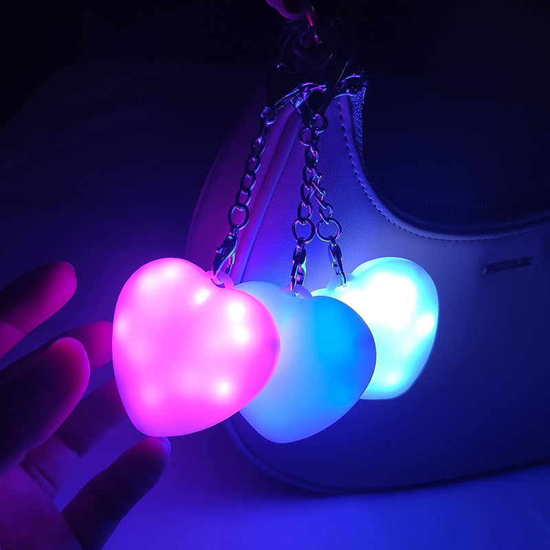 Heart-shaped LED lighted 3-color touch heart keychain. Find what you're looking for in your bag.